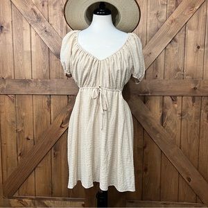 beige puff sleeve shoulder dress with side cutouts